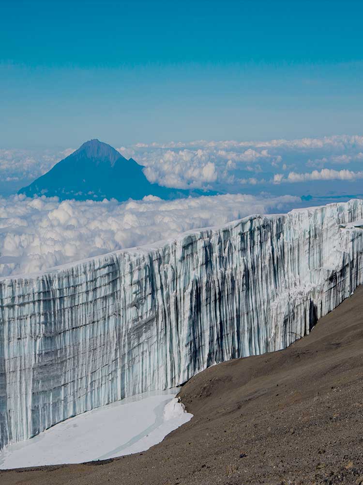 climb kilimanjaro to the summit glacier in sight with ©bushtreksafaris