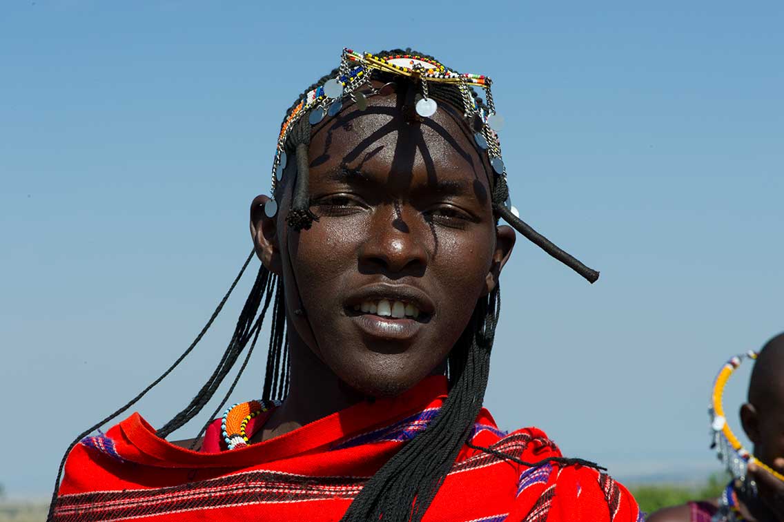 maasai warrior head shot with head ornaments worn ®bushtreksafaris