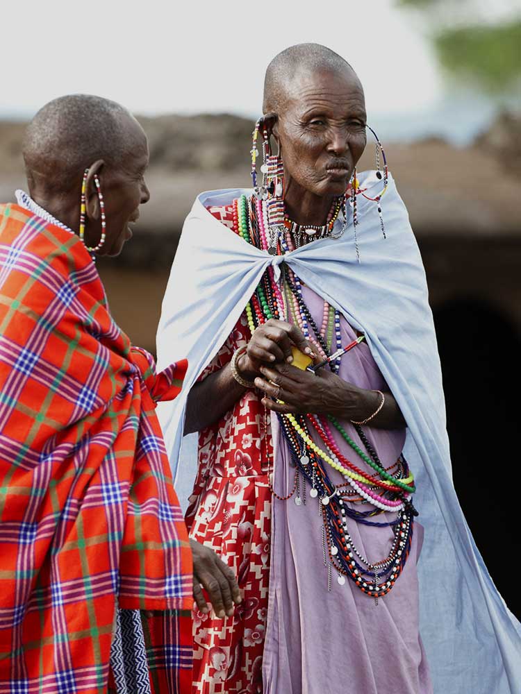 Elderly maasai couple in regalia at special ceremony meet the maasai in safari ©bushtreksafaris
