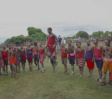 Masai Jump for tourists #1 while on safari in Kenya maasai mara organised by ©bushtreksafaris private safaris