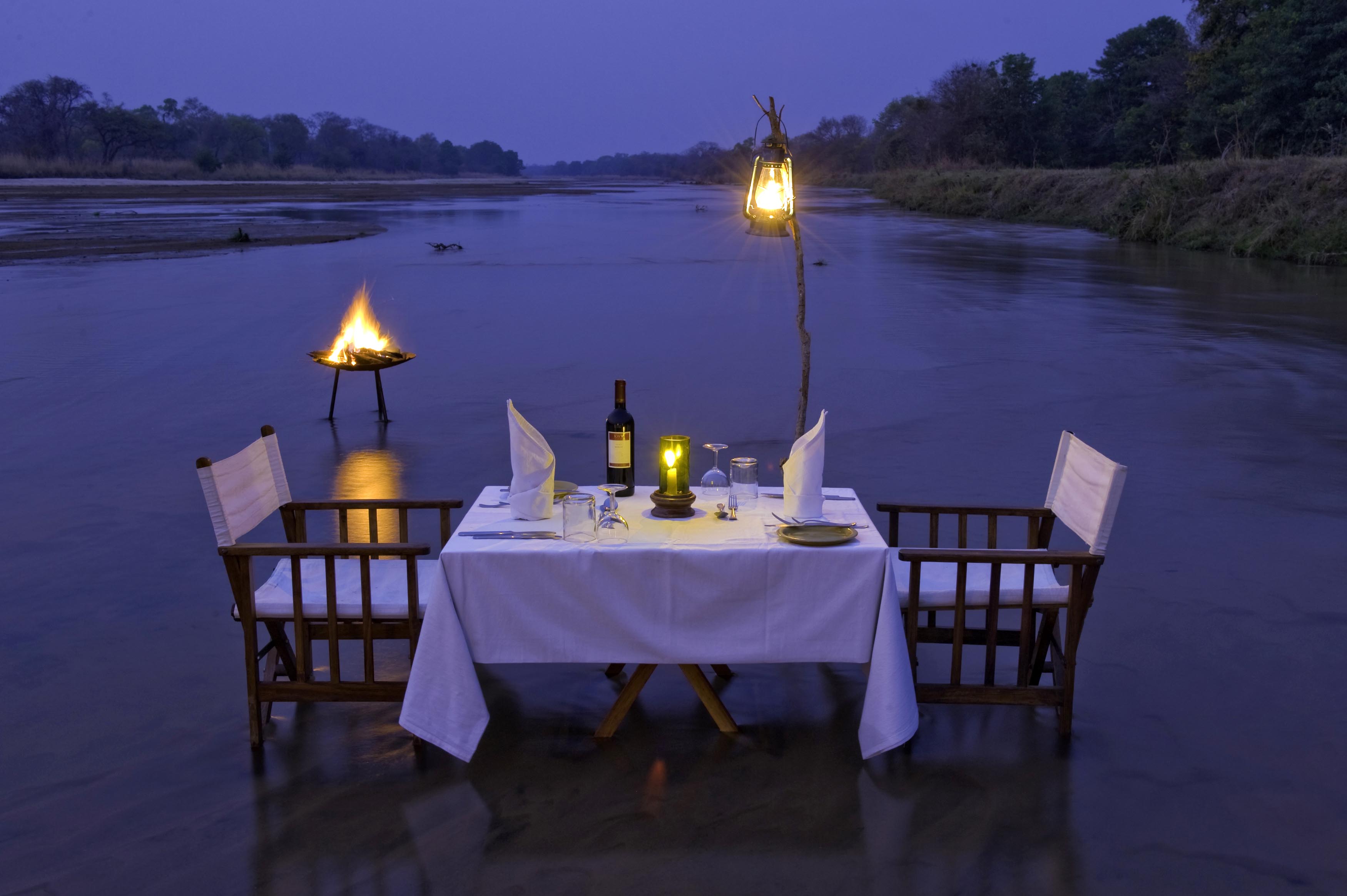 bush dinner for two on shallow water flats on honeymoon safari ®bushtreksafaris