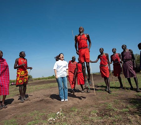 group of maasai warriors jump high meet the maasai on your safari to Kenya #best ©bushtreksafaris