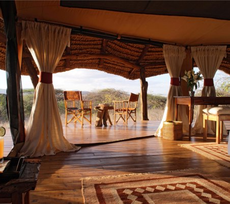 Lewa Safari Camp Tent Interior photo showing spectacular setting and view luxury conservancy safari