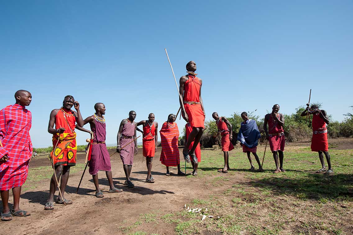 group of maasai warriors jump meet the maasai on your safari to Kenya #5 ®bushtreksafaris